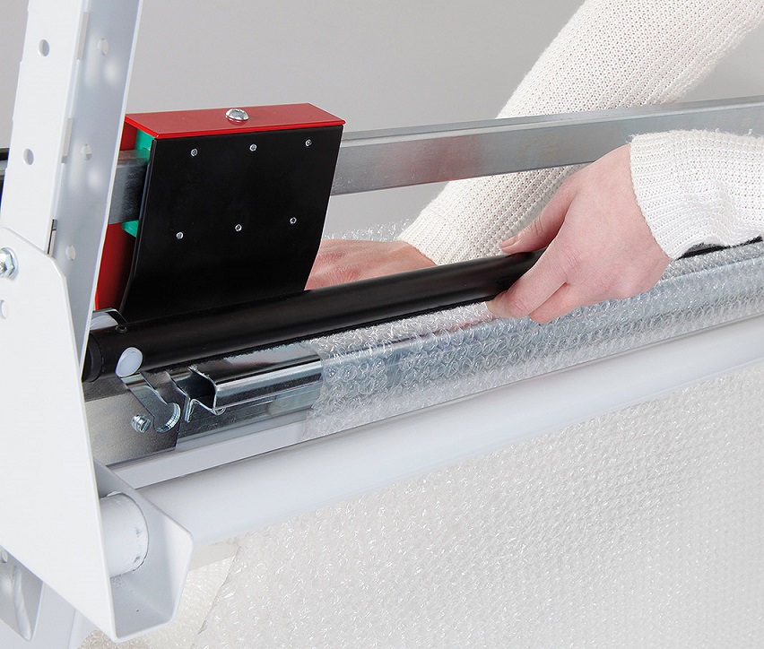 Table d'emballage avec 2 supports de rouleaux et cutter