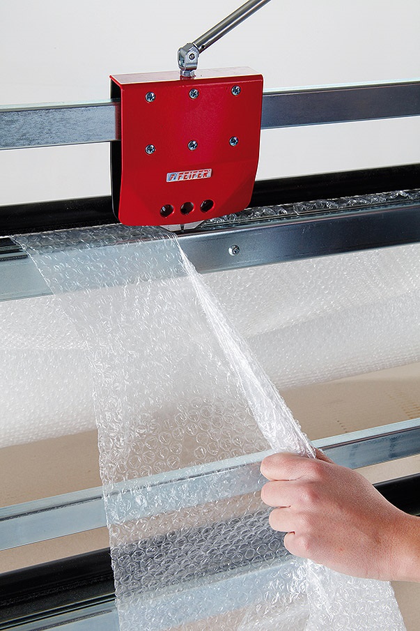 Support de découpe pour 2 rouleaux de matériau d'emballage horizontal